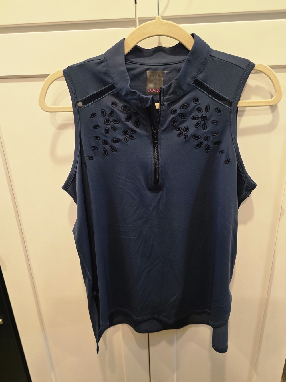 Lucky in Love Navy Sleeveless Zip Tank with Eyelet Embellishment